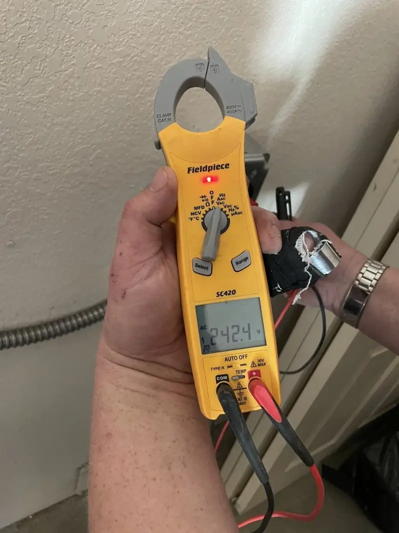 Voltage testing with clamp meter during Generator Installation in Largo